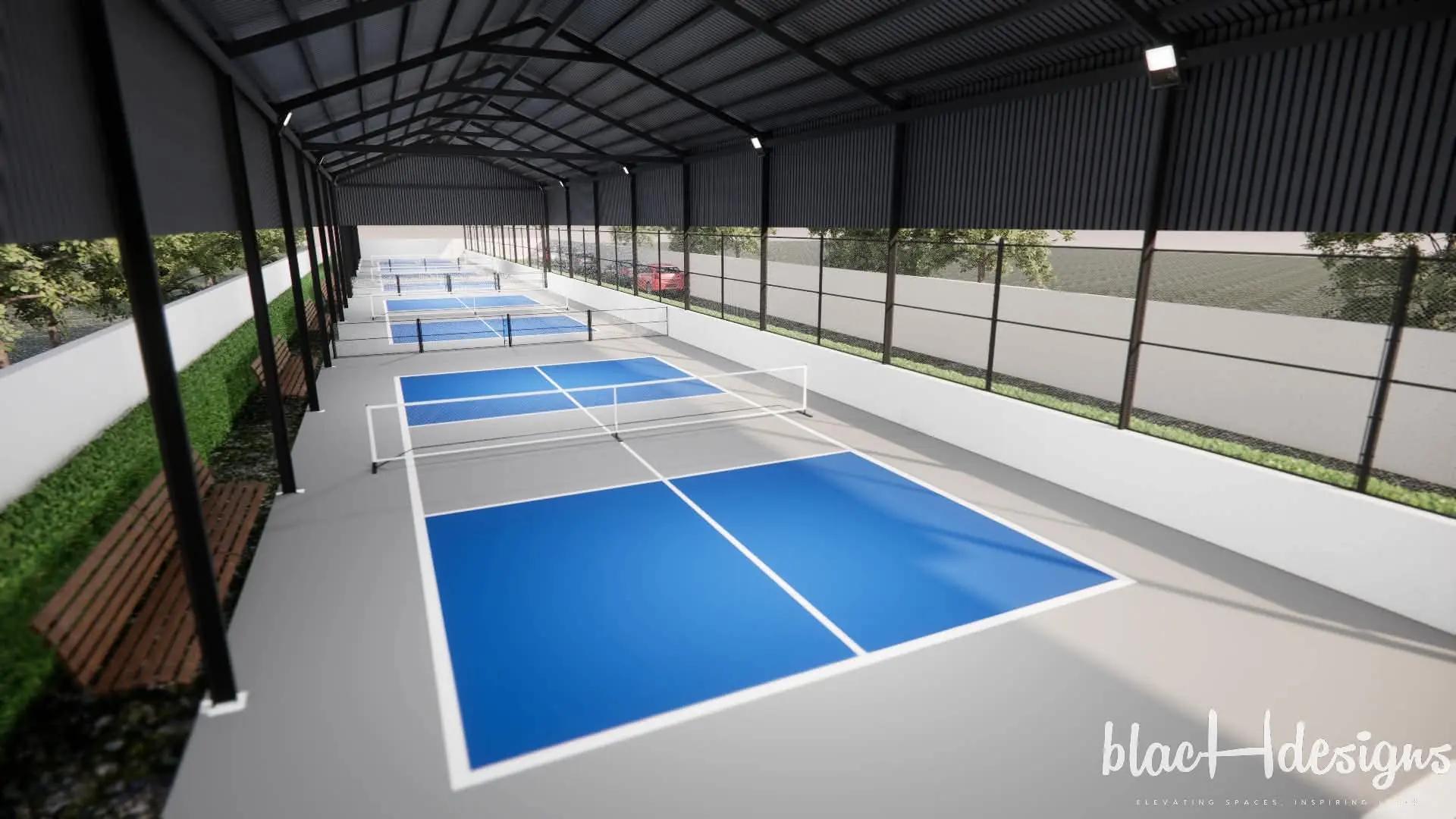 Render of four blue pickleball courts in a row beneath a long charcoal steel roof, with timber benches along one side